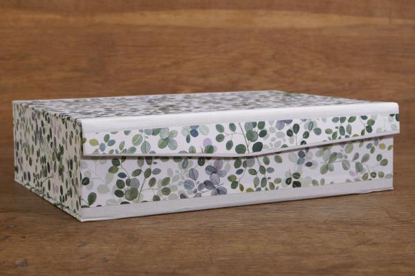 Handmade box with eucalyptus leaves, illustrated with watercolor, delicate green nuances, light linen edges
